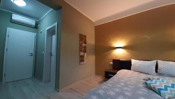 Фото номера Номер Делюкс (для 2 взрослых и 1 ребенка) Апарт-отели N.D Global Alba Iulia г. Алба-Юлия 3