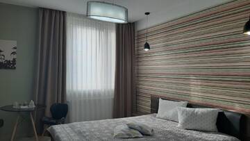 Фото номера Номер Делюкс (для 2 взрослых и 1 ребенка) Апарт-отели N.D Global Alba Iulia г. Алба-Юлия 4
