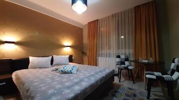 Фото номера Номер Делюкс (для 2 взрослых и 1 ребенка) Апарт-отели N.D Global Alba Iulia г. Алба-Юлия 5