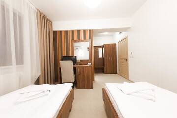 Фото номера Двухместный номер с 2 отдельными кроватями Отель Hotel Mariss г. Алба-Юлия 10