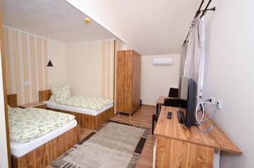 Фото номера Двухместный номер с 2 отдельными кроватями Отель Camere-Apartament Steyna г. Алба-Юлия 7