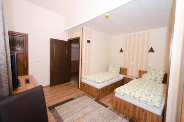 Фото номера Двухместный номер с 2 отдельными кроватями Отель Camere-Apartament Steyna г. Алба-Юлия 4