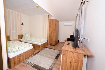 Фото номера Двухместный номер с 2 отдельными кроватями Отель Camere-Apartament Steyna г. Алба-Юлия 13