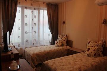 Фото номера Двухместный номер с 2 отдельными кроватями Отель Camere-Apartament Steyna г. Алба-Юлия 9